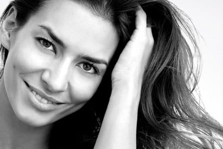 Middle-aged woman´s face with long dark hair