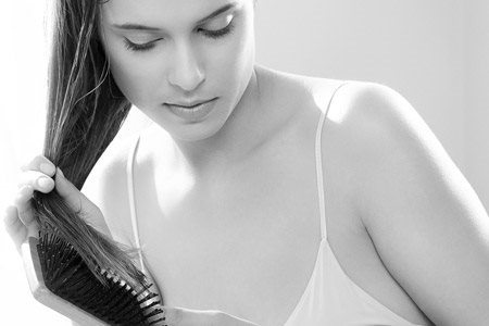 Woman distraught at hair loss