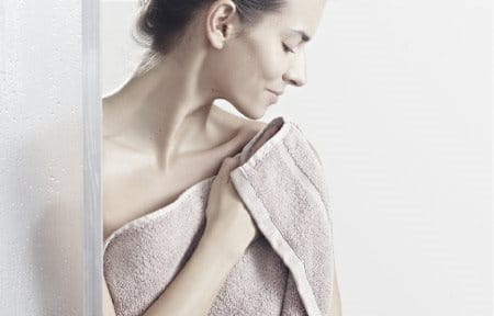 Woman wrapped in a towel.
